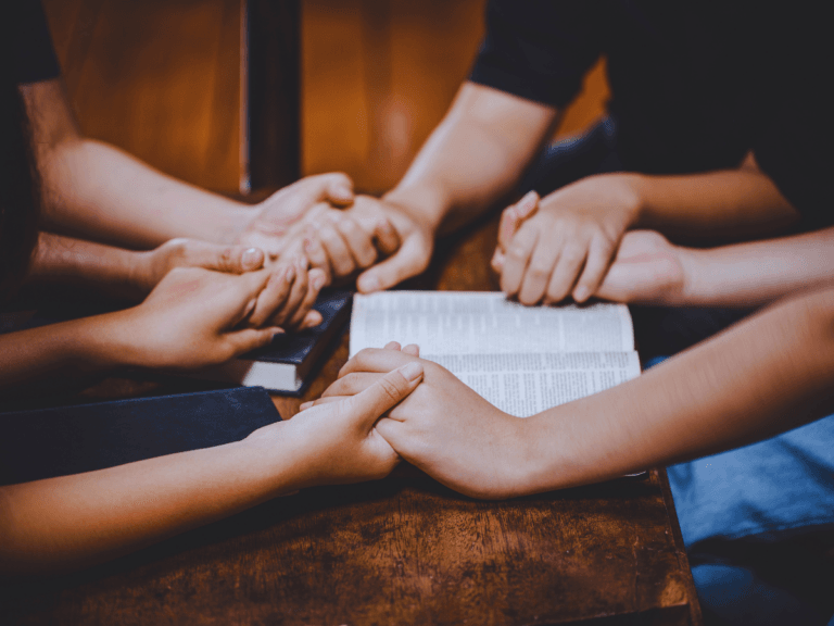 Christians Holding hands during prayer