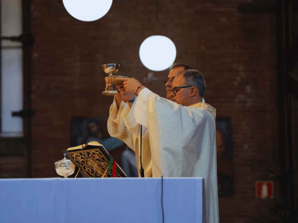 A Priest Raising the Eucarist