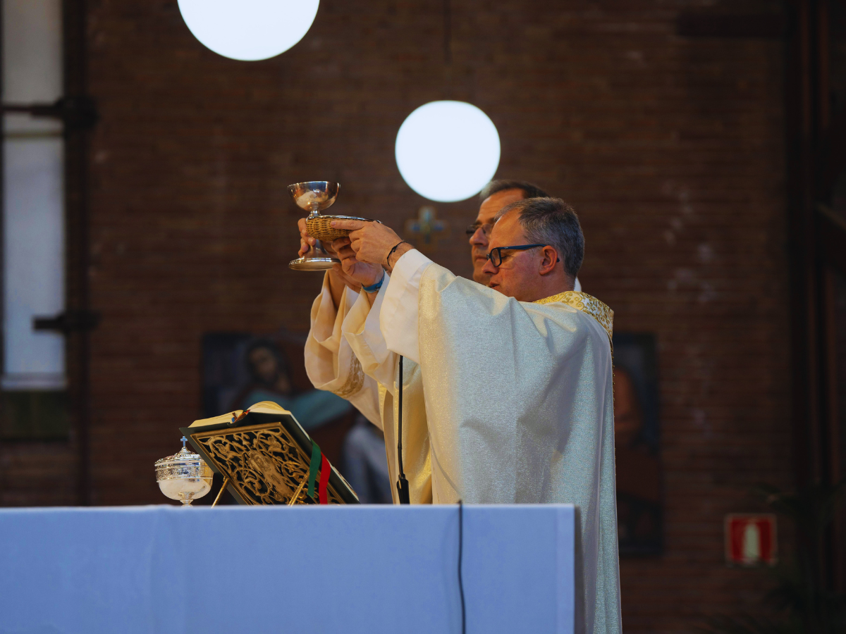 A Priest Raising the Eucarist